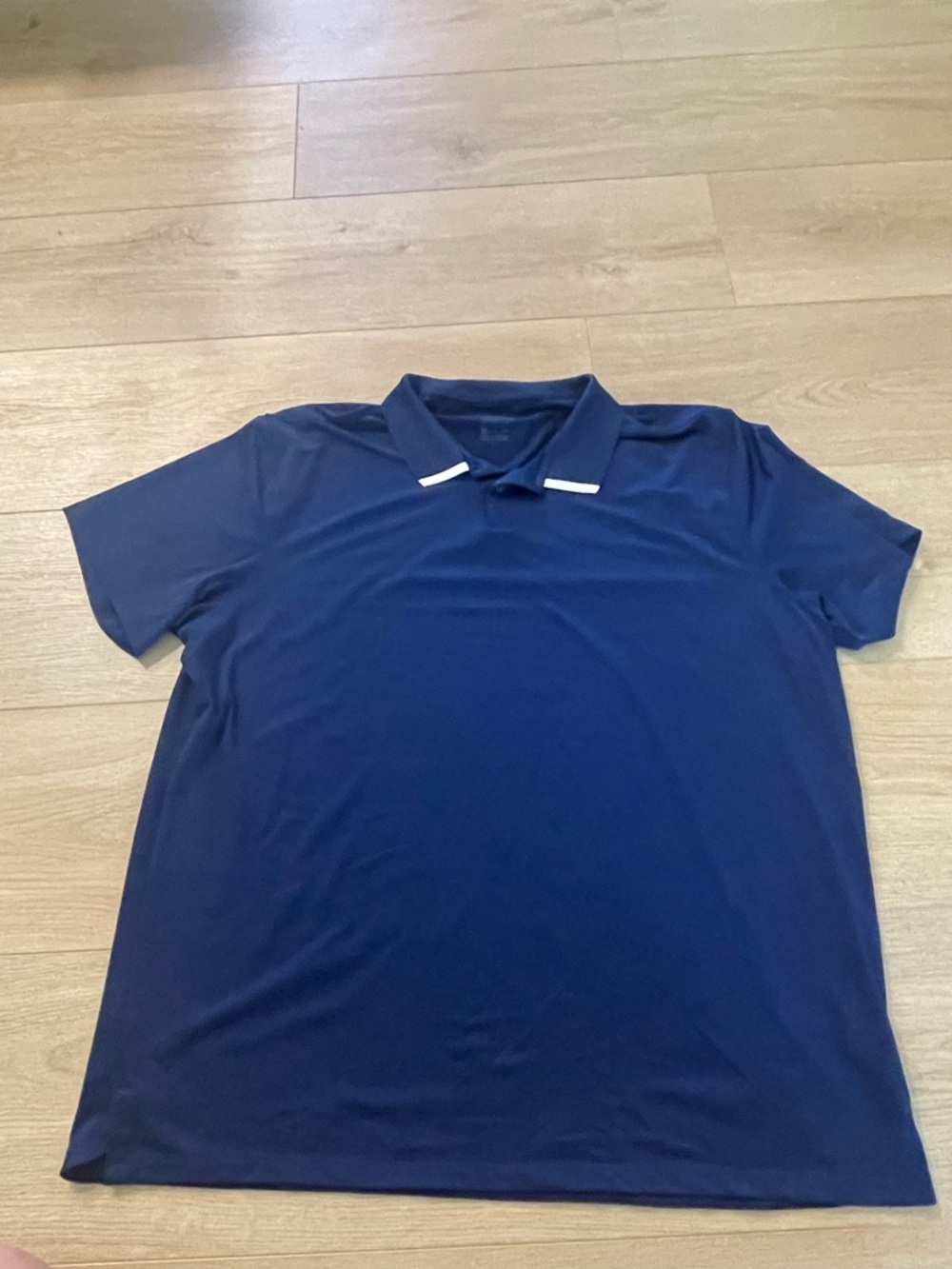 Nike Men's Navy Polo with Subtle White Collar Accents